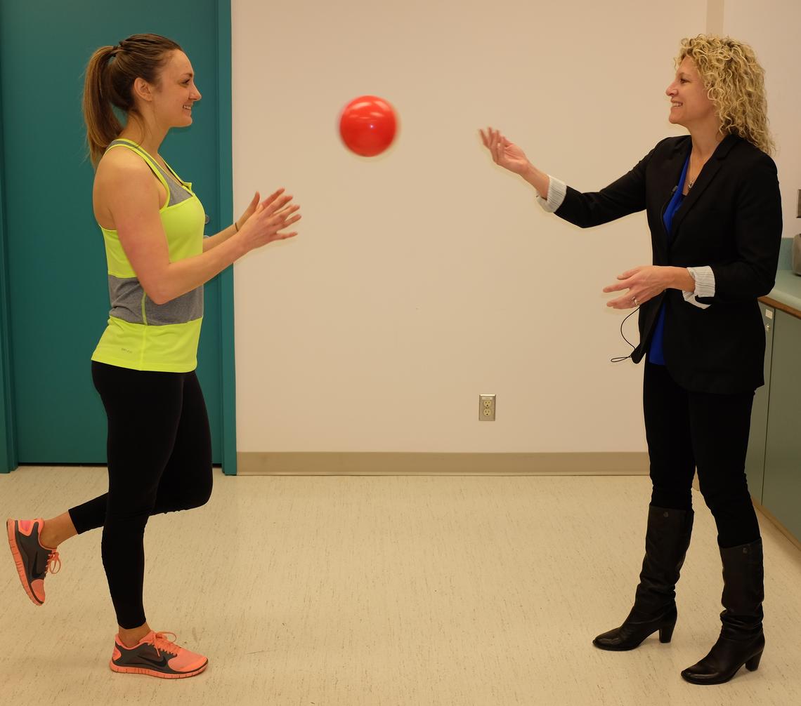 The University of Calgary's Kathryn Schneider demonstrates the latest rehabilitation techniques for concussion.