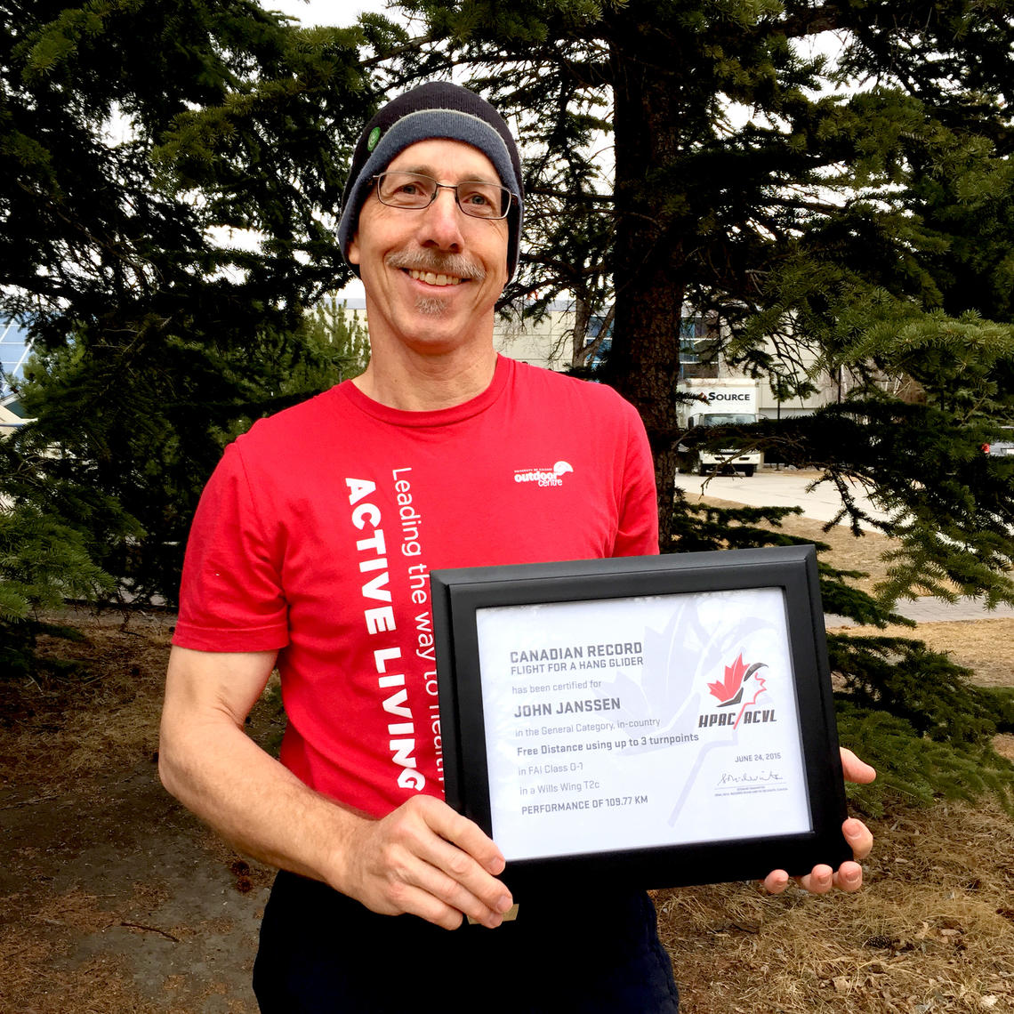 John Janssen shows his official Canadian Record certificate. 