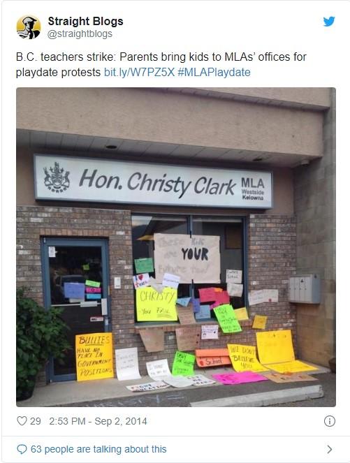 Exterior of MLA Cristy Clark's office with protest signs out front
