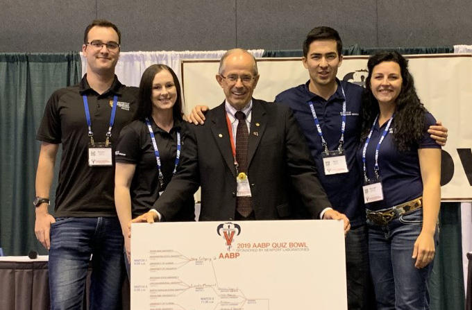 Gordon Atkins with UCVM students who were the first-ever Canadian team to win the AABP Quiz Bowl, from left: Brenden Hilgartner, Megan Dick, Nurmo Atabayev, and Rae-Leigh Pederzolli.