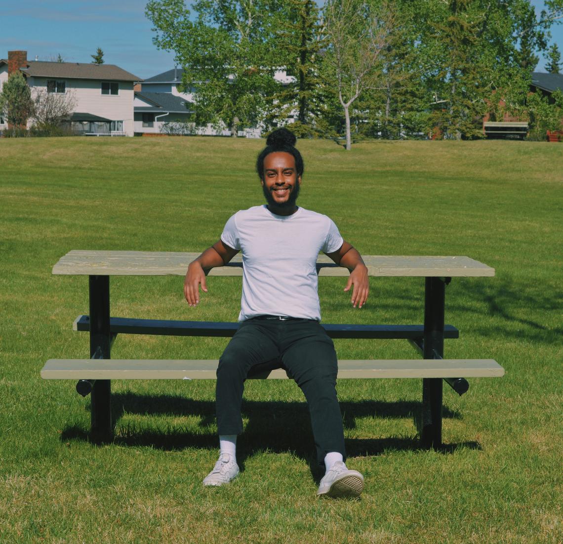 Economics grad Fetsami Araya relaxes in Calgary as he prepares for summer work with Statistics Canada