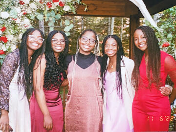Mercy and four of her friends at a wedding