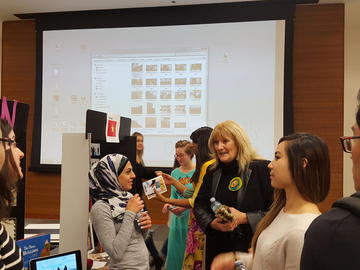 Associate Dean, Colleen Kawalilak talks to students at TAB showcase