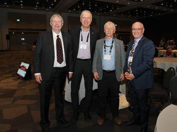 Herman Barkema, William Ghali, David Waltner-Toews and Michael Hart at the One Health Research Symposium.