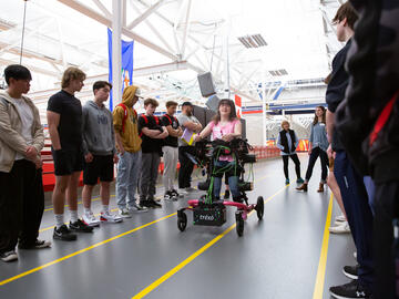 Alex Mertens, HPL research participant with cerebral palsy showcases how the Trexo, a robotic gait training system helps her walk