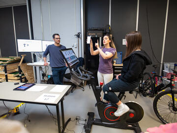 HPL research representatives demonstrate acceleration and velocity during cycling
