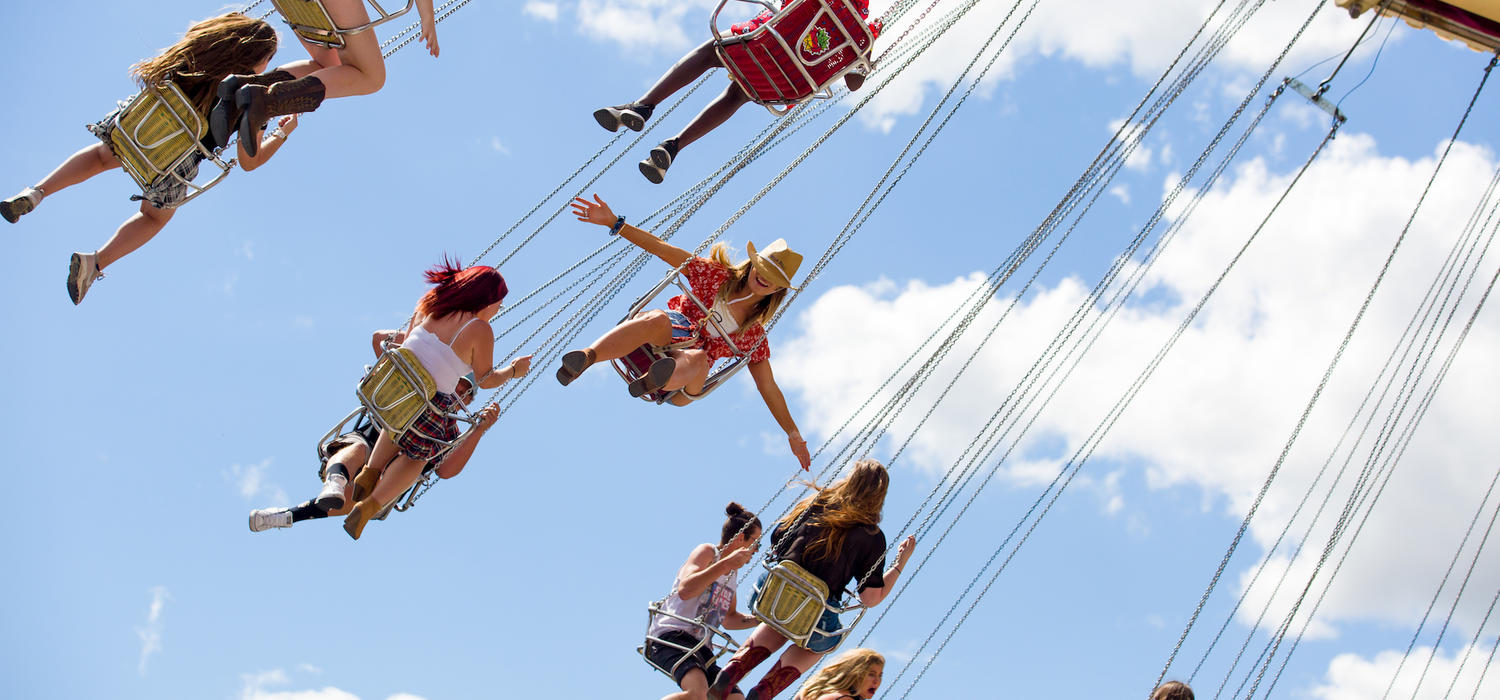 People having fun on a flying swing ride