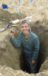 Masaki Hayashi conducts groundwater research in the field.