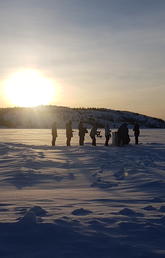 Huddled next to a frozen lake in the Northwest Territories, the Faculty of Science-led team from the University of Calgary conducts experiments in the spring of 2018.